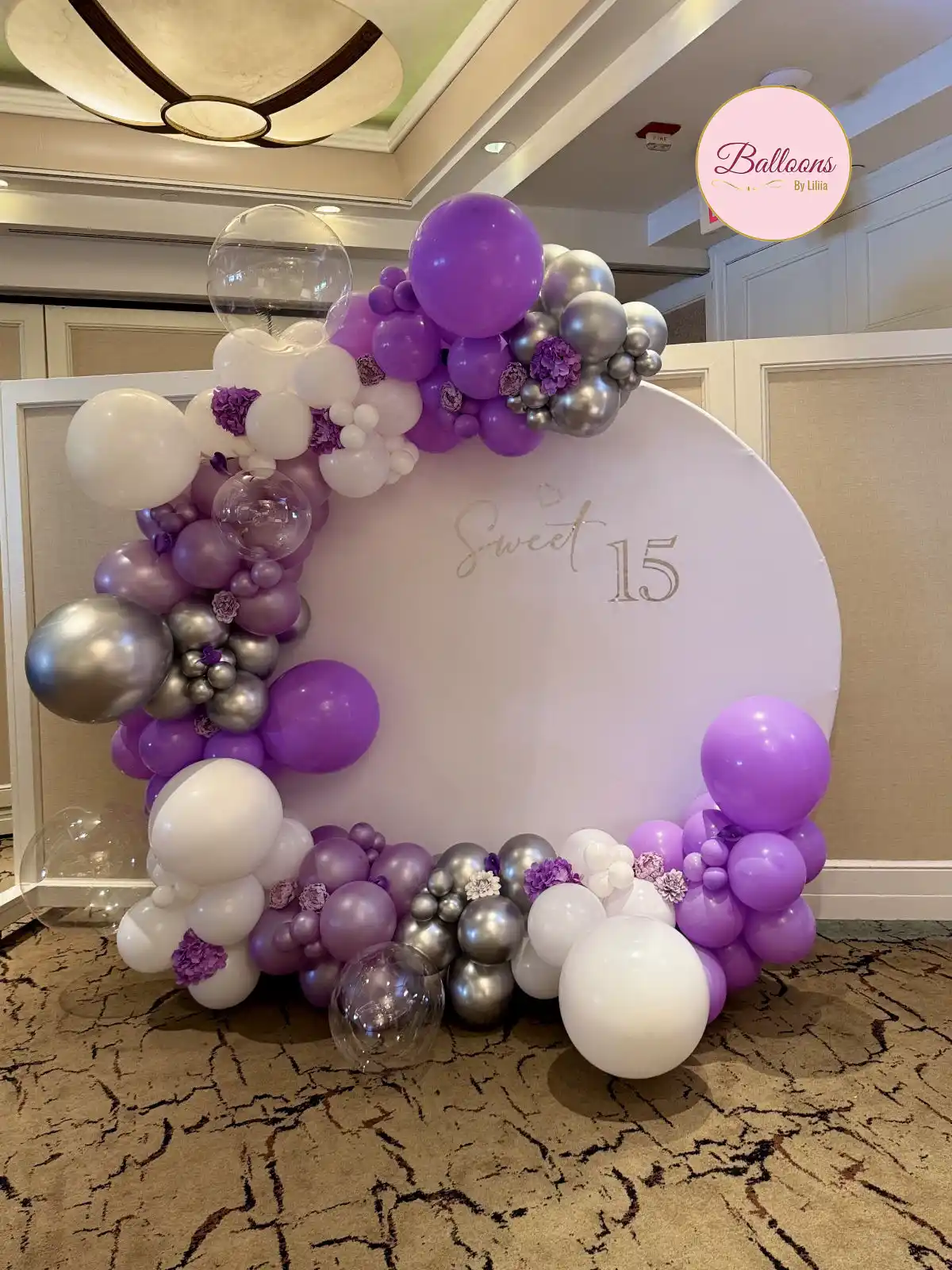 sweet 15 princess themed balloon setup for birthday party